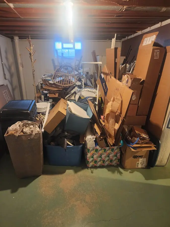 Roll-off dumpster container at job site for 2 Yard Dumpster Rental in Vermillion